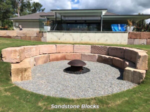 Fireplace using A Grade sandstone blocks. Set the summer in stone